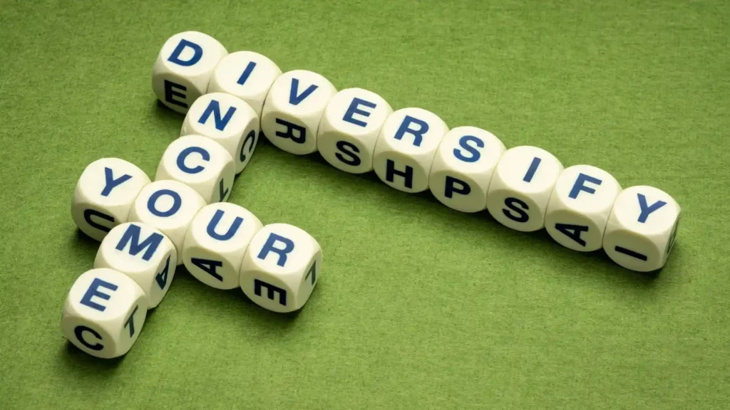 "diversify your income" written using blocks on a green background