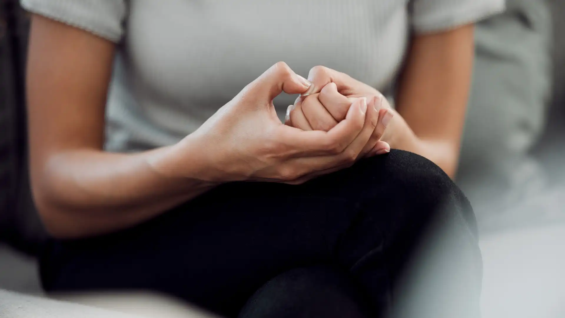 hand gesture shows that the woman is nervous