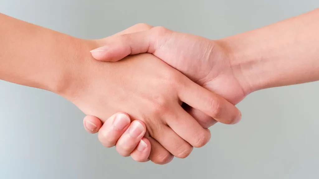 two people shaking hands