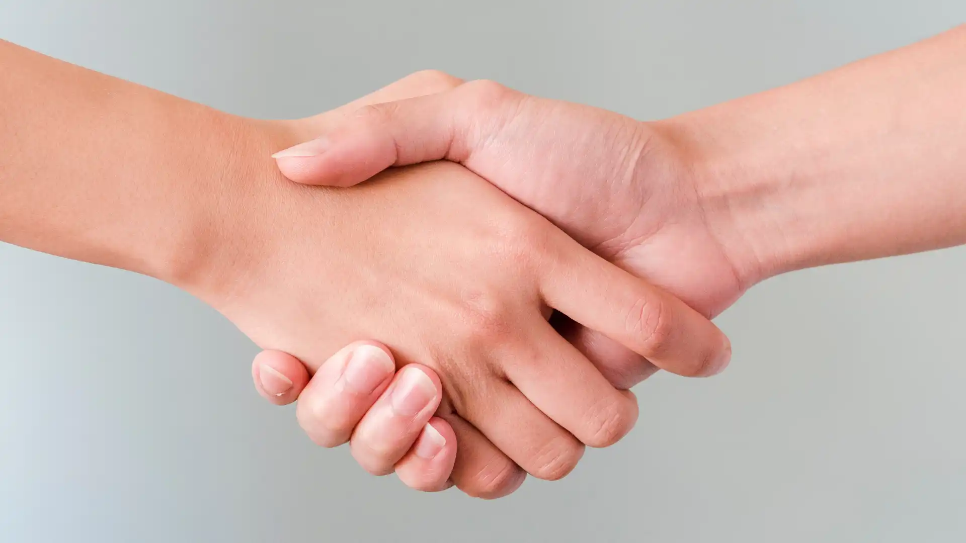 two people shaking hands